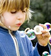 wikimedia commons - boy blowing bubbles boy blowing bubbles