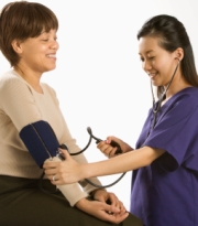checking blood pressure