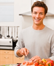 man cooking healthy